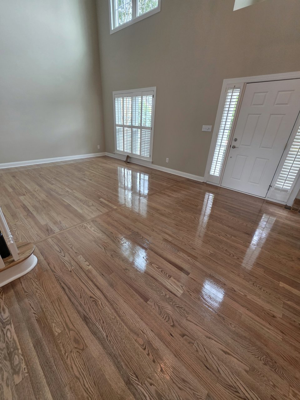 Light finished floor in a high-ceilinged room